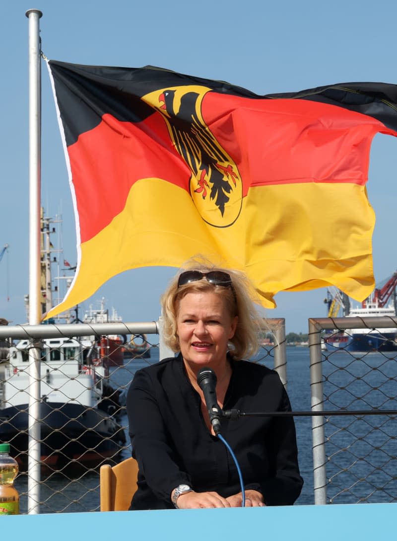 German Interior Minister Nancy Faeser presents the Federal Police's annual report during a press conference on board the Federal Police's border control ship "New Town" in the overseas port. Bernd Wüstneck/dpa