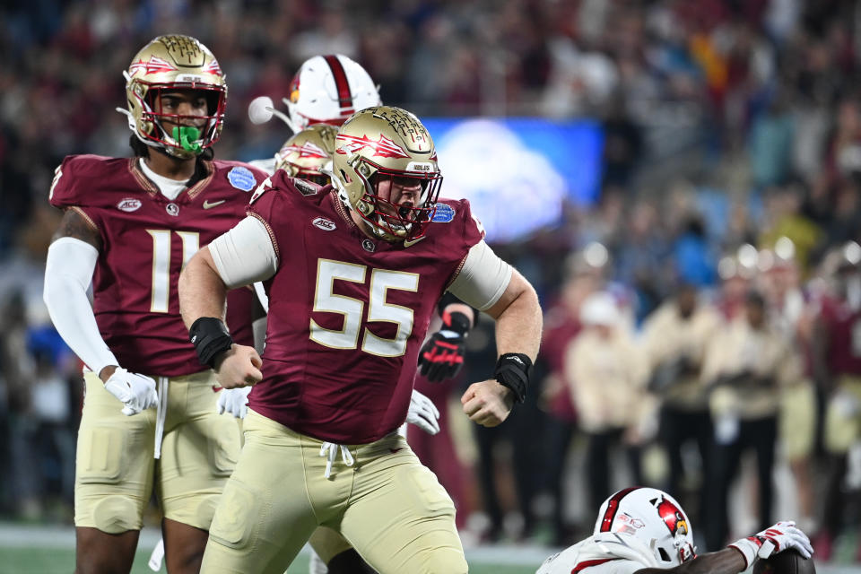 Dec 2, 2023; Charlotte, NC, USA; Florida State Seminoles defensive lineman Braden Fiske (55) reacts after a tackle on Louisville Cardinals running back <a class="link " href="https://sports.yahoo.com/ncaaf/players/299523/" data-i13n="sec:content-canvas;subsec:anchor_text;elm:context_link" data-ylk="slk:Jawhar Jordan;sec:content-canvas;subsec:anchor_text;elm:context_link;itc:0">Jawhar Jordan</a> (25) in the first quarter at Bank of America Stadium. Mandatory Credit: Bob Donnan-USA TODAY Sports