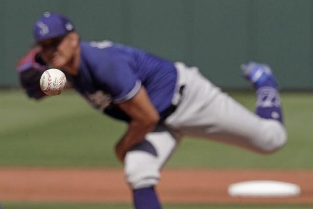 Los Angeles Dodgers relief pitcher Victor Gonzalez works in the