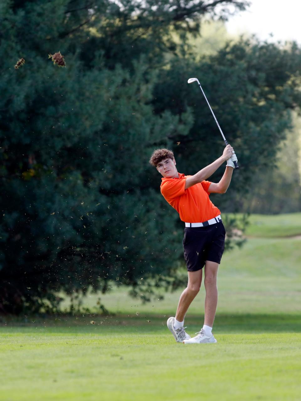 Gage Bonifant, of Strasburg, hits an iron shot during a Division III district golf tournament on Wednesday, Oct. 2, 2024, at River Greens in West Lafayette. Lancaster shot 76 to finish tied for third of 34 players.