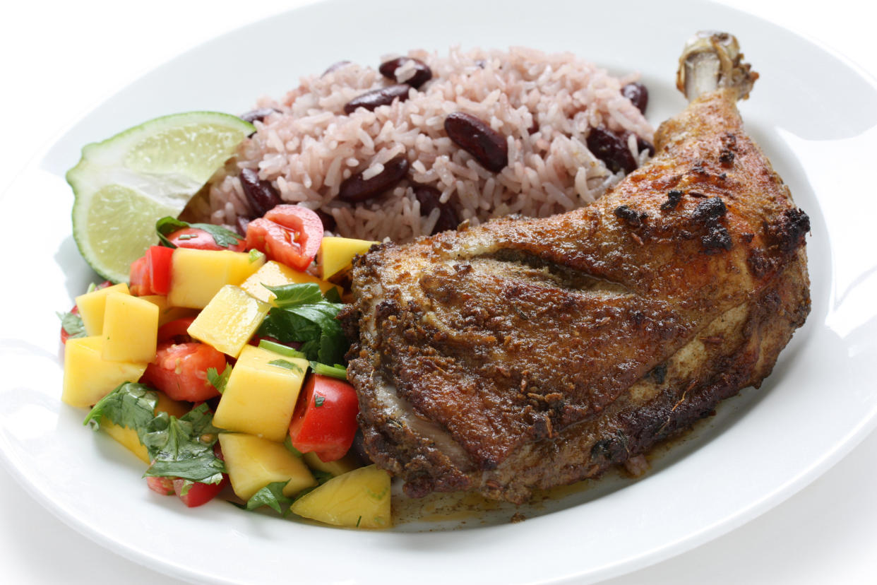 jerk chicken plate, jamaican food isolated on white background