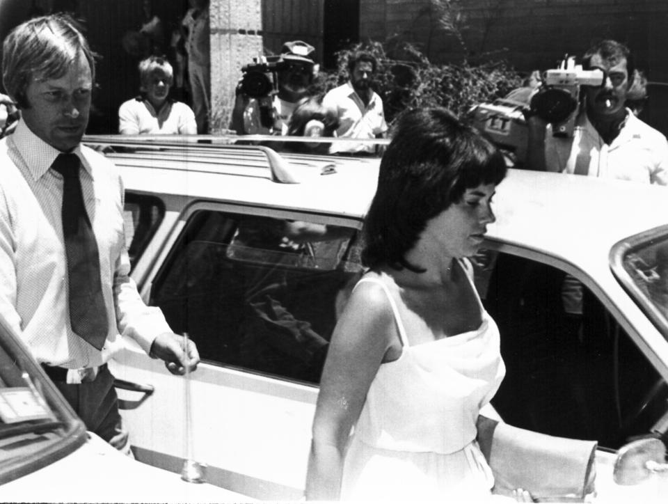 Michael, left, and Lindy Chamberlain leave a courthouse in Alice Springs.