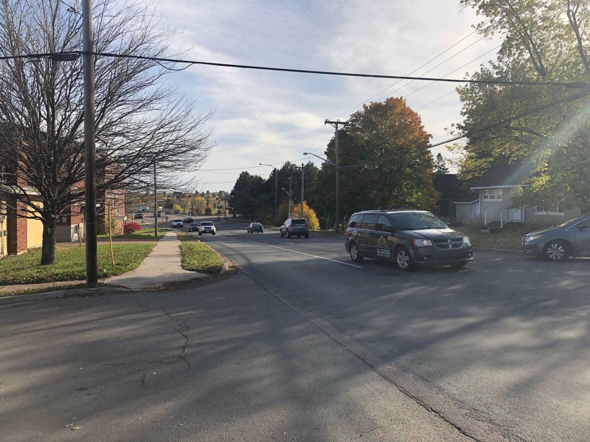 The intersection of Connaught Avenue and High Street in Moncton where a cyclist was killed last week. The city's active transit plan calls for a separated bike lane to be built along Connaught in the coming years.  (Khalil Akhtar/CBC - image credit)