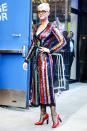 <p>Katy stayed on the right side of the fine line between best and worst dressed with her risky rainbow-striped Attico dress. <i>[Photo: Rex]</i> </p>