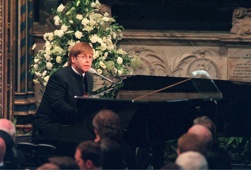 Sir Elton John singing 'Candle In The Wind' at Princess Diana's funeral in 1997. [Photo: PA]