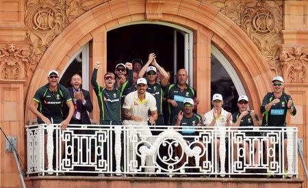 Cricket - England v Australia - Investec Ashes Test Series Second Test - Lord?s - 17/7/15 Australia's Mitchell Johnson and team mates on the dressing room balcony celebrate as Australia's Steve Smith reaches his double century Reuters / Philip Brown Livepic