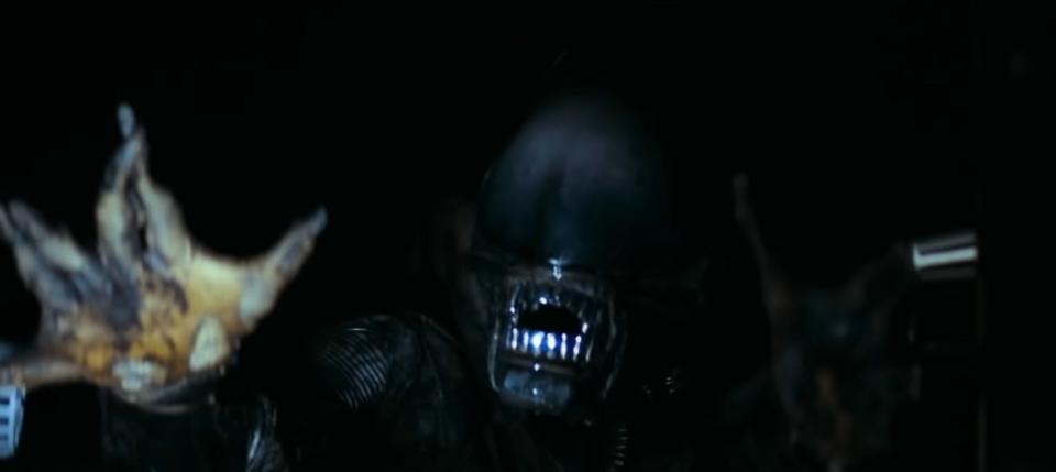 The Xenomorph hissing in the dark in "Alien"