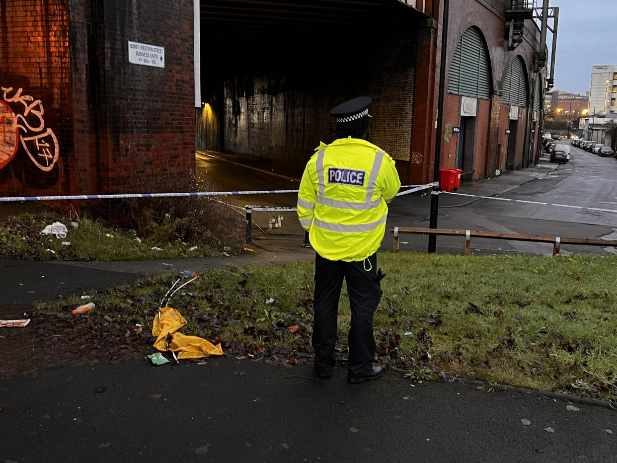 A 17-year-old girl has died in a horror crash in Manchester city centre which has left two men seriously injured.

Cops were called after a white Mercedes struck a railway bridge at the junction of Mancunian Way and Temperance Street at around 11.45pm last night [Jan 10].

Caption: Police at the junction of Mancunian Way and Temperance Street in Manchester city centre on 11 January 2022, scene of a fatal collision the previous night