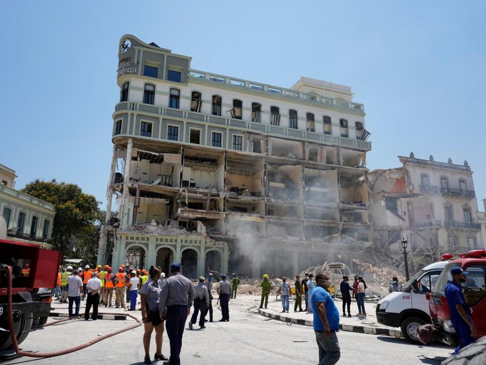Rooms are exposed at the five-star Hotel Saratoga where emergency crew work after a deadly explosion in Old Havana, Cuba, Friday, May 6, 2022 (AP)