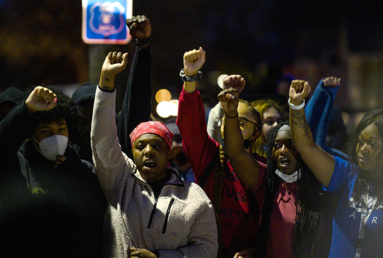 BROOKLYN CENTER, MN - APRIL 11: Demonstrators chant around a chalk circle that says Justice for Daunte Wright on April 11, 2021 in Brooklyn Center, Minnesota. Protesters took to the streets today after 20 year old Daunte Wright was shot and killed during a traffic stop by members of the Brooklyn Center police. (Photo by Stephen Maturen/Getty Images)