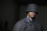 A model wears a creation as part of the Jieda 20/21 collection, that was presented in Milan, Italy, Tuesday, Jan. 14, 2020. (AP Photo/Luca Bruno)