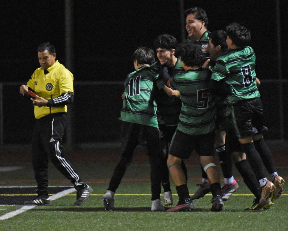 Victor Valley’s Osmin Carranza celebrates with teammates after scoring his second goal during the second half against Adelanto on Thursday, Jan. 11, 2024 at Ray Moore Stadium. Adelanto tied Victor Valley played in a 3-3 draw.
