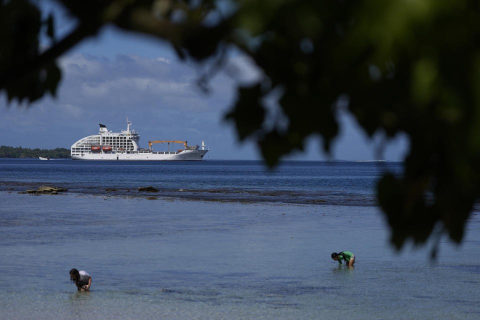 Olympic surfers sleep on a cruise ship in Tahiti, a first for the Games