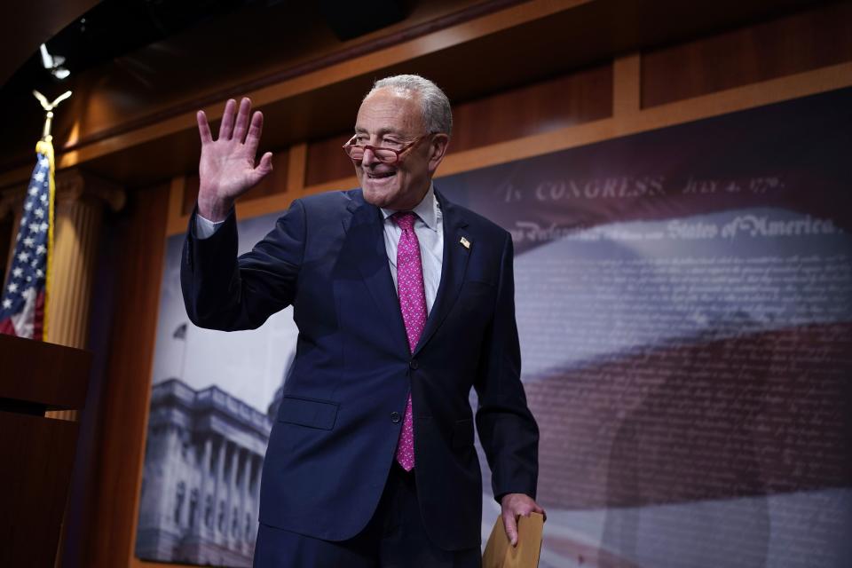 Senate Majority Leader Chuck Schumer, D-N.Y., says good night after speaking to reporters following a hectic series of amendment votes and final passage on the big debt ceiling and budget cuts package, at the Capitol in Washington, Thursday, June 1, 2023. The legislation now goes to President Joe Biden's desk to become law before the fast-approaching default deadline. (AP Photo/J. Scott Applewhite)