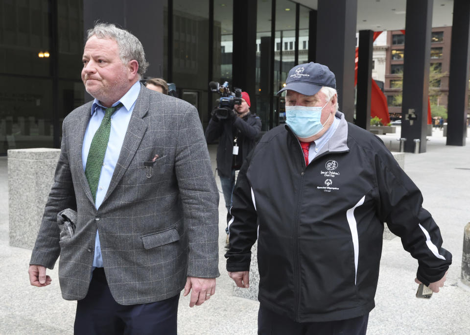 Consultant Jay Doherty, right, leaves the Dirksen U.S. Courthouse in Chicago on Tuesday, May 2, 2023, after his verdict is read. Federal jurors convicted all four defendants of bribery at their trial which provided an inside look at pay-to-play politics in Illinois that prosecutors said involved the state’s largest electric utility and, at the time, one of its most powerful politicians. (Terrence Antonio James/Chicago Tribune via AP)