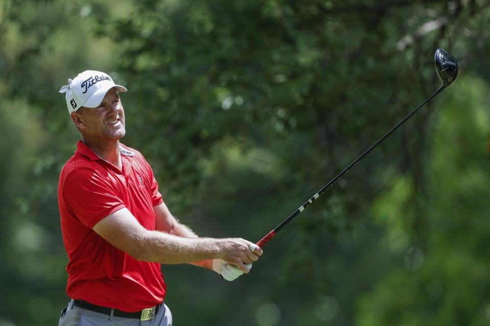 Robert Karlsson, of Sweden, watches his tee shot on the second hole during the final round of a Champions Tour golf tournament, Sunday, May 14, 2023, in Hoover, Ala. (AP Photo/Butch Dill)