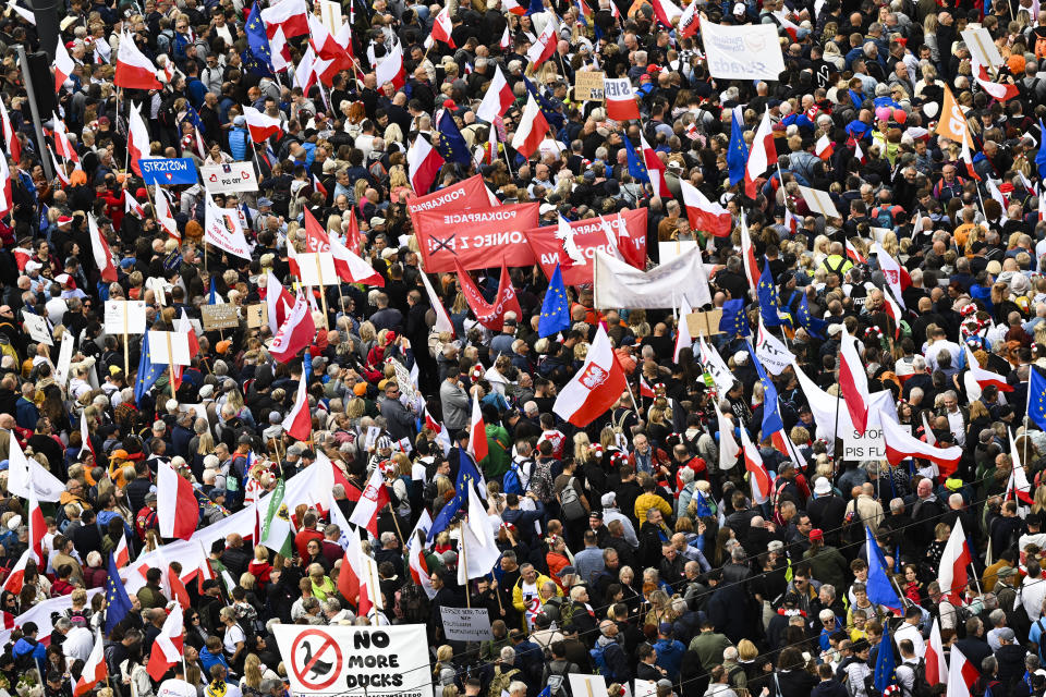 Thousands of people gather for a march to support the opposition against the governing populist Law and Justice party in Warsaw, Poland, Sunday, Oct. 1, 2023. Polish opposition leader Donald Tusk seeks to boost his election chances for the parliament elections on Oct. 15, 2023, leading the rally in the Polish capital. (AP Photo/Rafal Oleksiewicz)