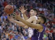 <p>Gonzaga forward Killian Tillie, left, and Northwestern guard Sanjay Lumpkin (34) battle for a rebound during the second half of a second-round college basketball game in the men’s NCAA Tournament Saturday, March 18, 2017, in Salt Lake City. (AP Photo/Rick Bowmer) </p>