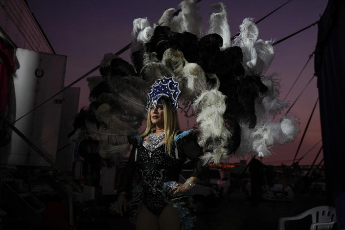 Timoteo Circus performer Adolfo Salas dressed in character as Prince Angel poses for a photo in Santiago, Chile, Sunday, Dec. 18, 2022. The Timoteo Circus is a show that has fought prejudice and discrimination against Chile’s LGBTQ community for more than a half century. (AP Photo/Esteban Felix)