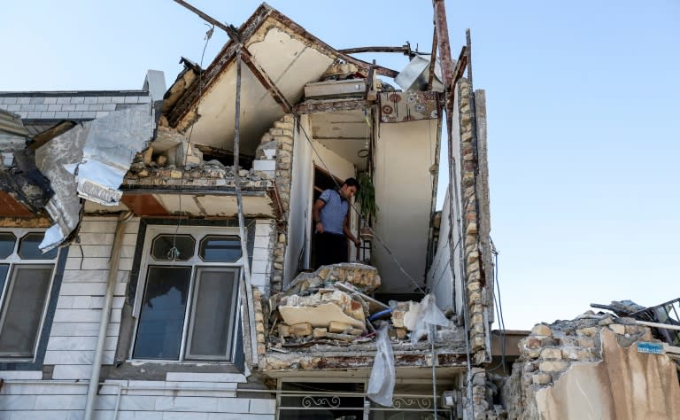 A building in Iran's western town of Sar-e Pol-e Zahab is among thousands to have been damaged or destroyed in a major earthquake