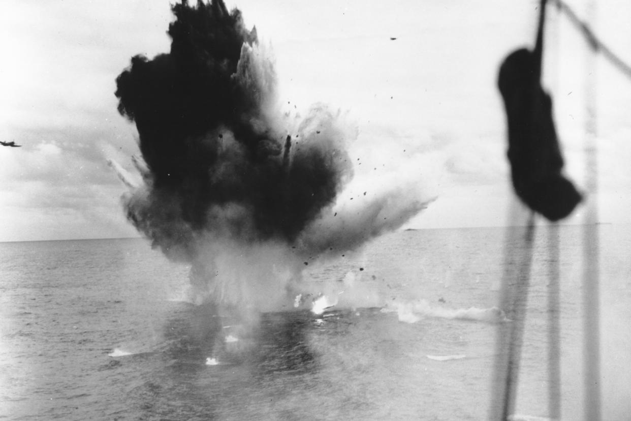 Seen from a U.S. carrier, a Japanese suicide bomber crashes into the sea off the coast of Okinawa, Japan, in June 1945.   (AP)