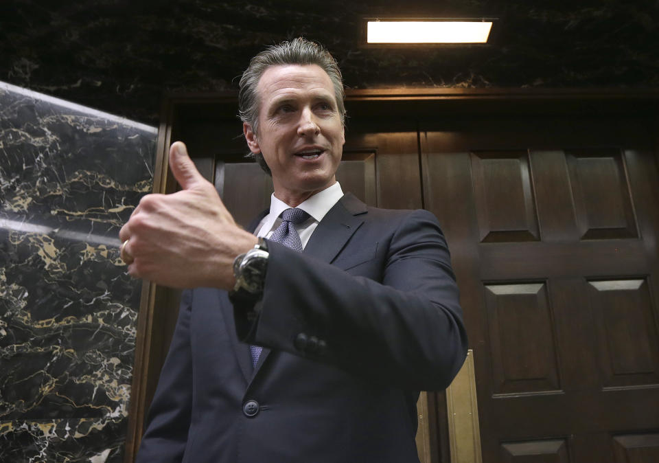 California Gov. Gavin Newsom discusses the results of an investigation that found Pacific Gas & Electric was not responsible for the Tubbs Fire, Thursday, Jan. 24, 2019, in Sacramento, Calif. State fire investigators released a report Thursday saying the deadly 2017 wildfire that scorched Napa and Sonoma counties was caused by a privately maintained electric lines. Newsom said it will be up to PG&E to decide whether to move ahead with a planned bankruptcy. (AP Photo/Rich Pedroncelli)