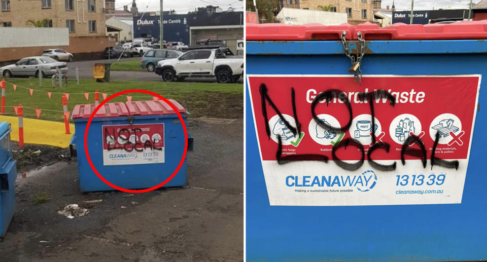 A rubbish bin in Lismore with the words 'not local' sprawled on the front in spray paint
