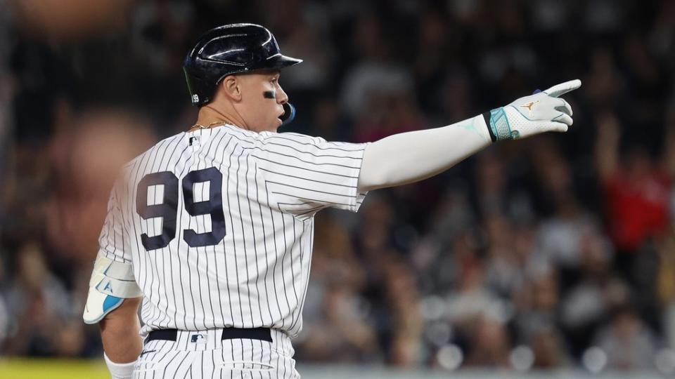 Sep 22, 2023; Bronx, New York, USA; New York Yankees right fielder Aaron Judge (99) reacts after hitting a double during the first inning against the Arizona Diamondbacks at Yankee Stadium.