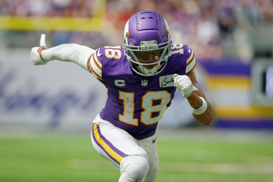 Minnesota Vikings wide receiver Justin Jefferson runs a route against the Tampa Bay Buccaneers during the second half of an NFL football game, Sunday, Sept. 10, 2023, in Minneapolis.