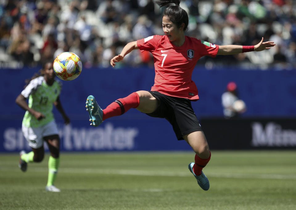 South Korea's Lee Min-a stretches for the ball during the Women's World Cup Group A soccer match between Nigeria and South Korea in Grenoble, France, Wednesday June 12, 2019.(AP Photo/Laurent Cipriani)