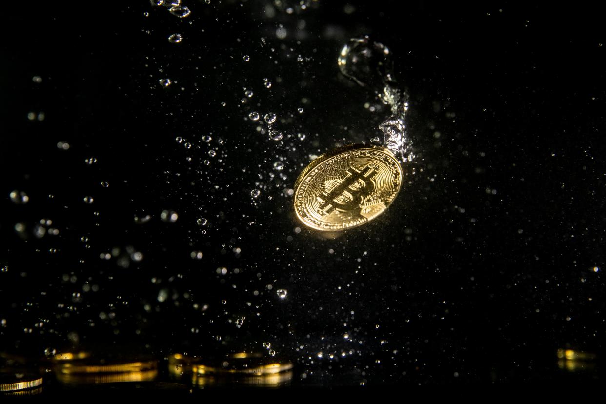 <p>A visual representation of the digital currency Bitcoin sinking into water on 15 August, 2018 in London, England</p> (Getty Images)