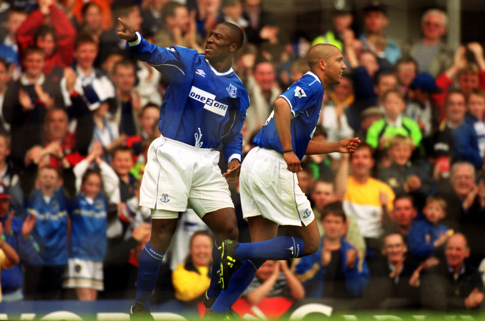 Campbell celebrates one of his three goals against West Ham on the final day of the 1998/1999 season