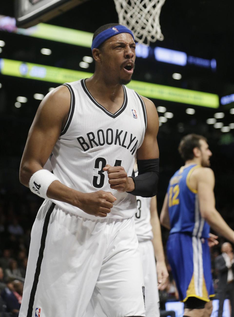 Brooklyn Nets' Paul Pierce (34) reacts after being fouled during the first half of an NBA basketball game against the Golden State Warriors on Wednesday, Jan. 8, 2014, in New York. (AP Photo/Frank Franklin II)