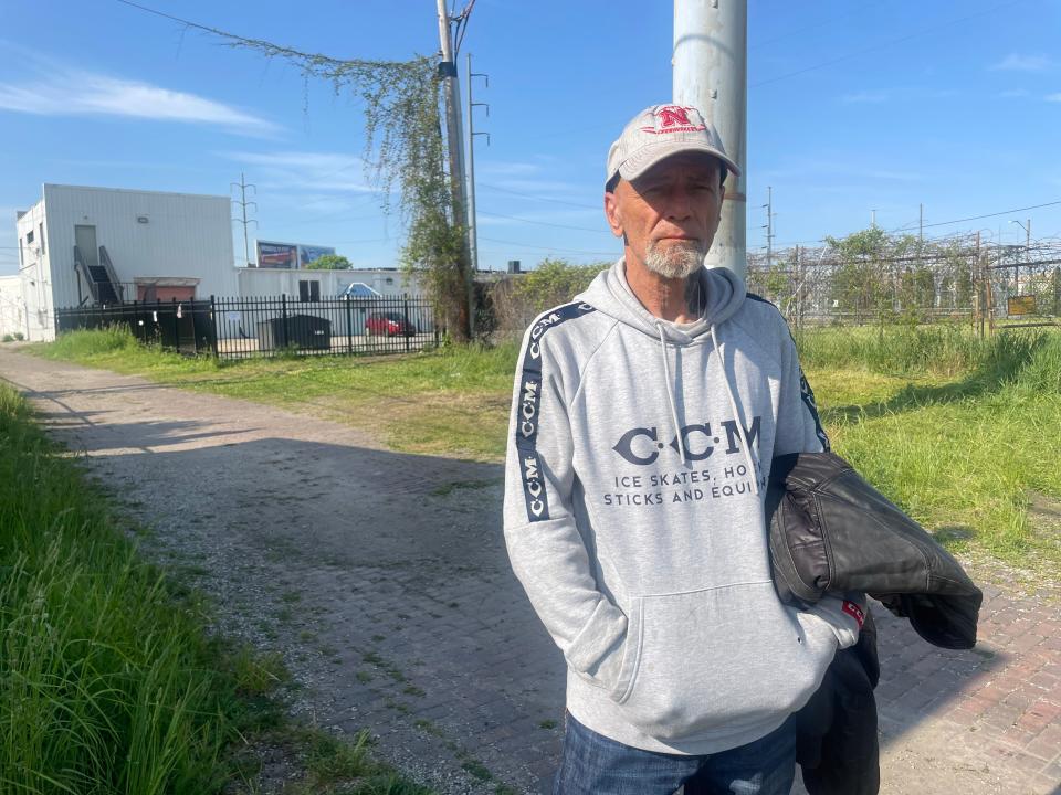 Rich Mullenix stands in front of the site where about two dozen people formed a homeless camp in downtown South Bend this May.