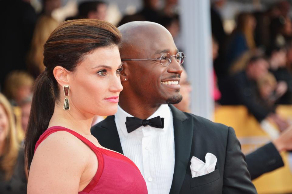 Actors Idina Menzel and Taye Diggs arrive at the 19th Annual Screen Actors Guild Awards held at The Shrine Auditorium on January 27, 2013 in Los Angeles.