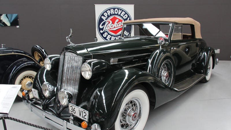 A black 1936 Packard 1407 Twelve Convertible