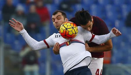 Football Soccer - AS Roma v Genoa - Italian Serie A - Olympic Stadium, Rome, Italy - 20/12/15. AS Roma's Kostas Manolas (R) and Genoa's Goran Pandev in action. REUTERS/Tony Gentile