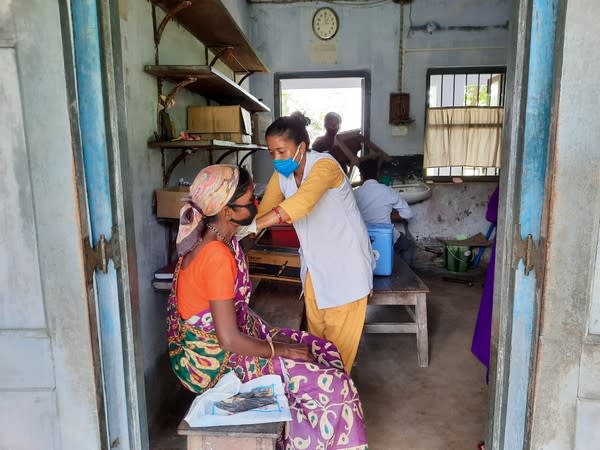 A tribal receiving a COVID-19 vaccine dose in Siliguri on Saturday. [Photo/ANI]