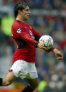 Ruud Van Nistelrooy netted 25 goals for Manchester United on their way to another league title, with Nike slightly tweaking the Geo Merlin. 1,000 goals were scored in the Vapor's first season. (Photo by Phil Noble - PA Images/PA Images via Getty Images)