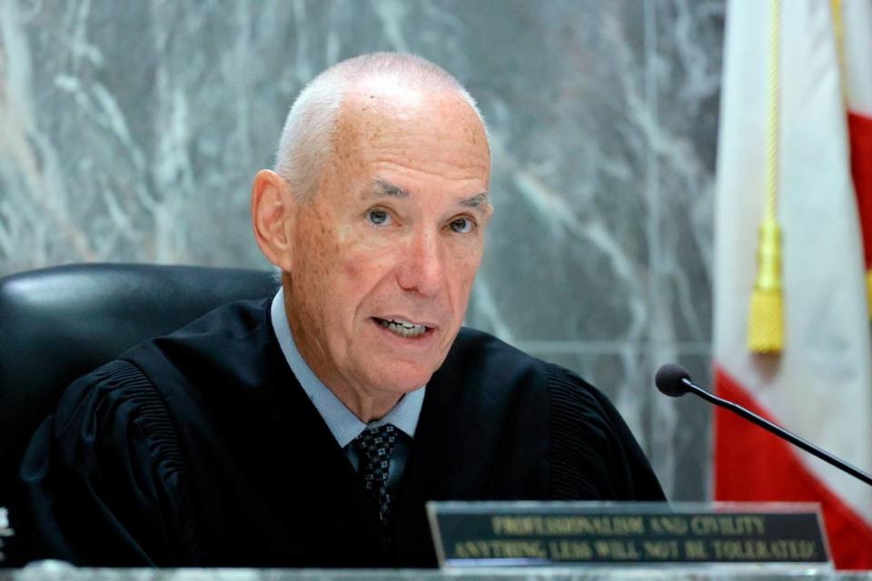 Judge John Murphy reads jury instructions before closing arguments in the trial of Jamell Demons, better known as rapper YNW Melly, at the Broward County Courthouse in Fort Lauderdale on Thursday, July 20, 2023. Demons, 22, is accused of killing two fellow rappers and conspiring to make it look like a drive-by shooting in October 2018. (Amy Beth Bennett / South Florida Sun Sentinel)