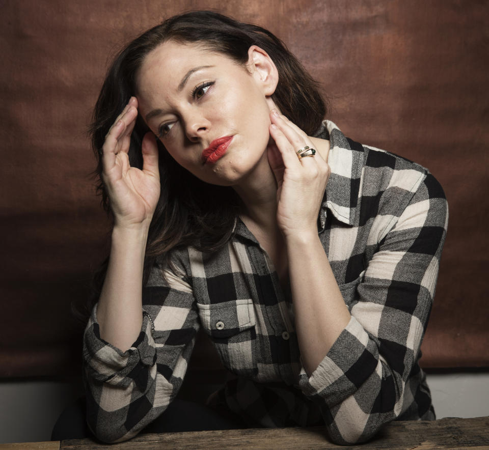 Rose McGowan poses for a portrait at Quaker Good Energy Lodge with GenArt and the Collective , during the Sundance Film Festival, on Friday, Jan. 17, 2014 in Park City, Utah. (Photo by Victoria Will/Invision/AP)