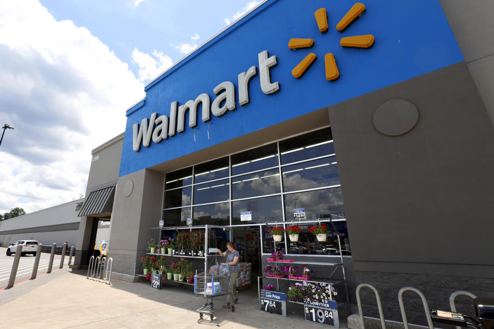 FILE - This June 25, 2019, file photo shows the entrance to a Walmart in Pittsburgh. Walmart reports its third quarter earnings on Thursday, Nov. 14. (AP Photo/Gene J. Puskar, File)