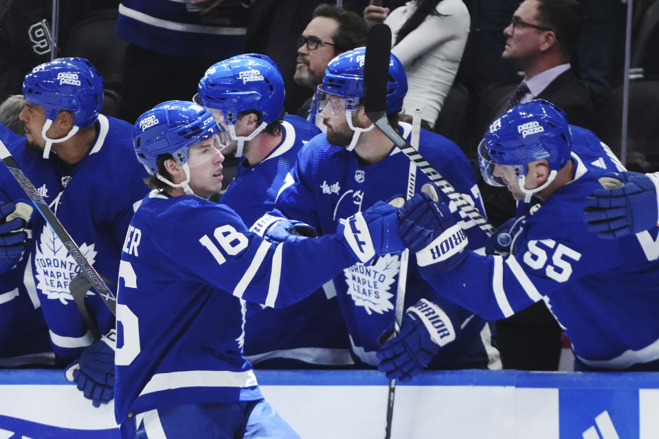 Toronto Maple Leafs forward Mitchell Marner (16) celebrates his goal against the Dallas Stars during the third period of an NHL hockey game Wednesday, Feb. 7, 2024, in Toronto. (Nathan Denette/The Canadian Press via AP)