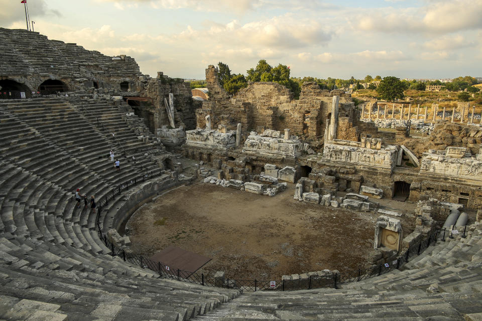 A partial view of the ancient Roman theatre in Antalya, southern Turkey, on Sunday, June 20, 2021. Hotels in Turkey's Antalya region, a destination beloved by holidaymakers, are preparing to finally resume operations as they expect the return of international tourists after months of setbacks caused by the pandemic that halted travel. (AP Photo/Emrah Gurel)