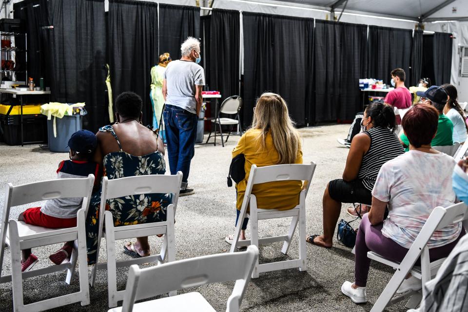 Patients wait for their treatment inside the Regeneron Clinic at a monoclonal antibody treatment site in Pembroke Pines, Florida, on August 19, 2021. - Florida Governor Ron DeSantis announced the opening of the Covid-19 antibody treatment site. DeSantis continues to promote the monoclonal antibody treatments as cases and hospitalizations spike in Florida. Starting Wednesday, C.B. Smith Park will start offering the antibody treatment from 9 a.m. to 5 p.m. seven days a week. The site will be able to treat over 300 patients a day. (Photo by CHANDAN KHANNA / AFP) (Photo by CHANDAN KHANNA/AFP via Getty Images)