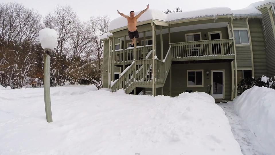 Thrill-seeking residents in Boston are taking to social media with videos of them jumping out of windows into massive snow drifts.