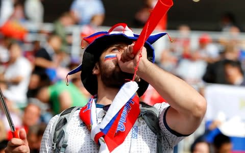 A Russian fan enjoys the pre match atmosphere prior to the 2018 FIFA World Cup Russia - Credit: Kevin C. Cox/Getty Images