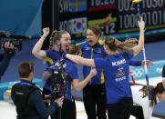 Curling - Pyeongchang 2018 Winter Olympics - Women's Final - Sweden v South Korea - Gangneung Curling Center - Gangneung, South Korea - February 25, 2018 - Team Sweden celebrate their win. REUTERS/Cathal McNaughton