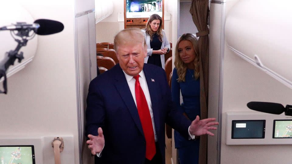 Cassidy Hutchinson and Press Secretary Kayleigh McEnany watch as President Trump speaks aboard Air Force One after a campaign event in Wisconsin - Tom Brenner/Reuters