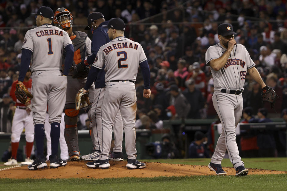 Houston Astros starting pitcher Jose Urquidy leaves the game against the Boston Red Sox during the second inning in Game 3 of baseball's American League Championship Series Monday, Oct. 18, 2021, in Boston. (AP Photo/Winslow Townson)